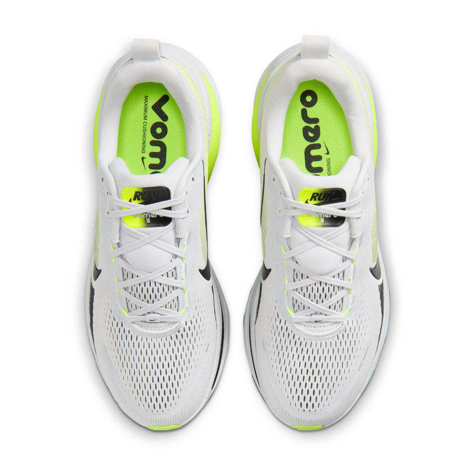 The uppers of a pair of Nike Men's Vomero 18 Road Running Shoes in the Photon Dust/Black-Volt colourway.