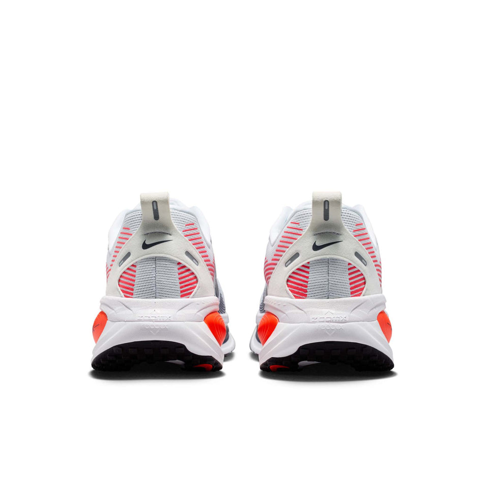 The back of a pair of Nike Men's Vomero 18 Road Running Shoes in the White/Midnight Navy-Bright Crimson-Black colourway.