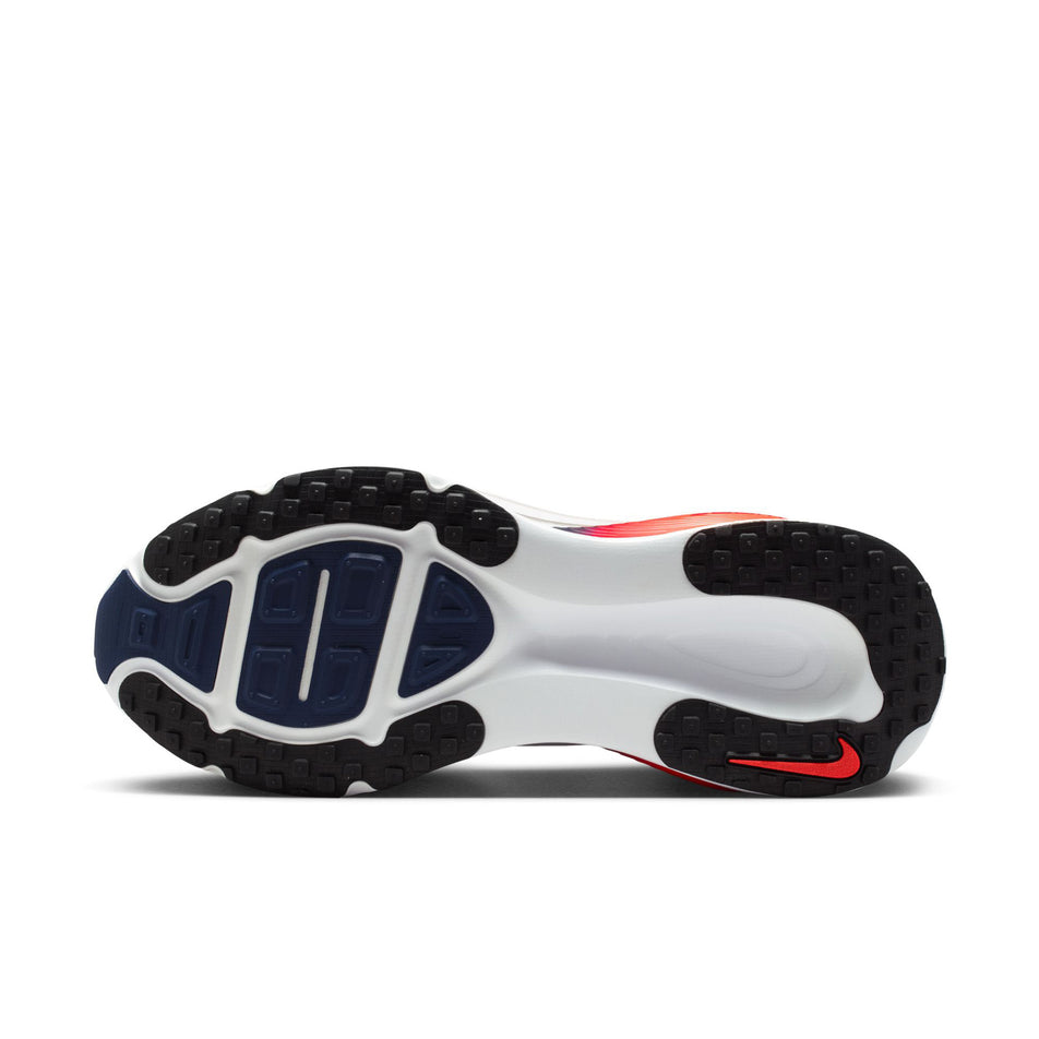 The outsole of the left shoe from a pair of Nike Men's Vomero 18 Road Running Shoes in the White/Midnight Navy-Bright Crimson-Black colourway.