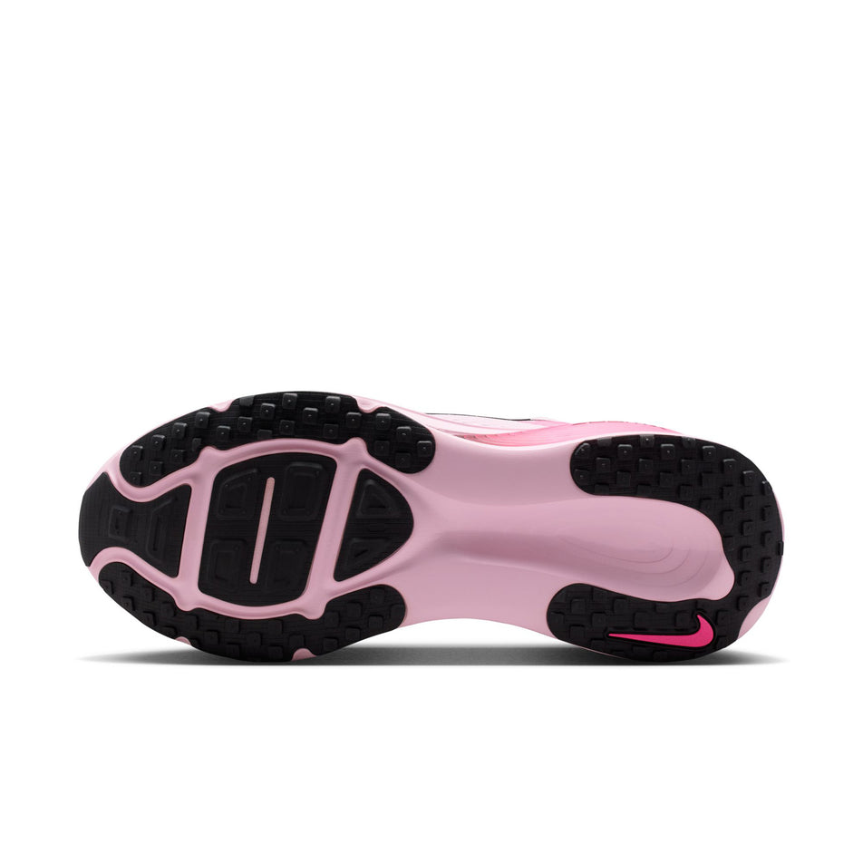 The outsole of the left shoe from a pair of Nike Men's Vomero 18 Road Running Shoes in the Pink Foam/Black-Hyper Pink colourway.