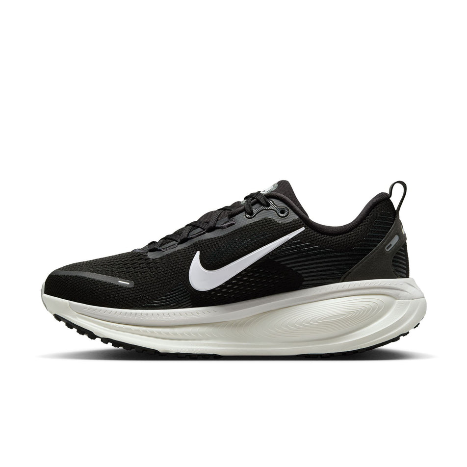 Medial view of the right shoe from a pair of Nike Women's Vomero 18 Road Running Shoes in the Black/Summit White-Coconut Milk colourway. (8686787657890)