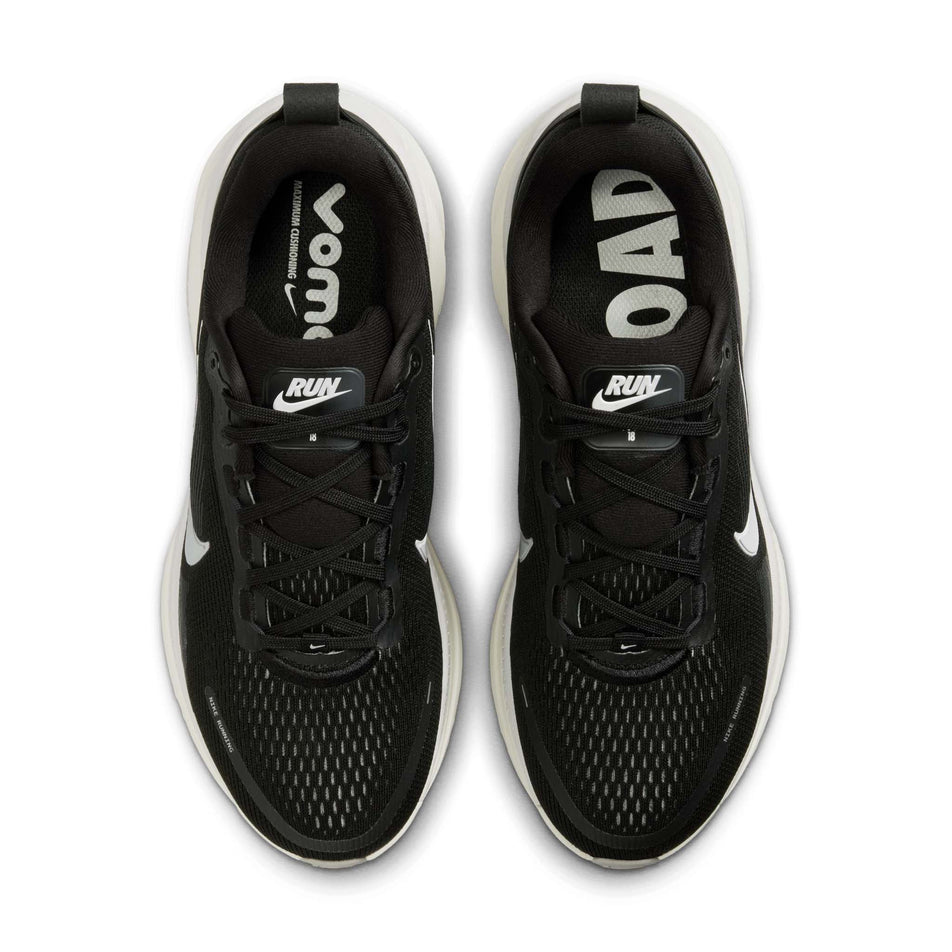 The uppers of a pair of Nike Women's Vomero 18 Road Running Shoes in the Black/Summit White-Coconut Milk colourway. (8686787657890)