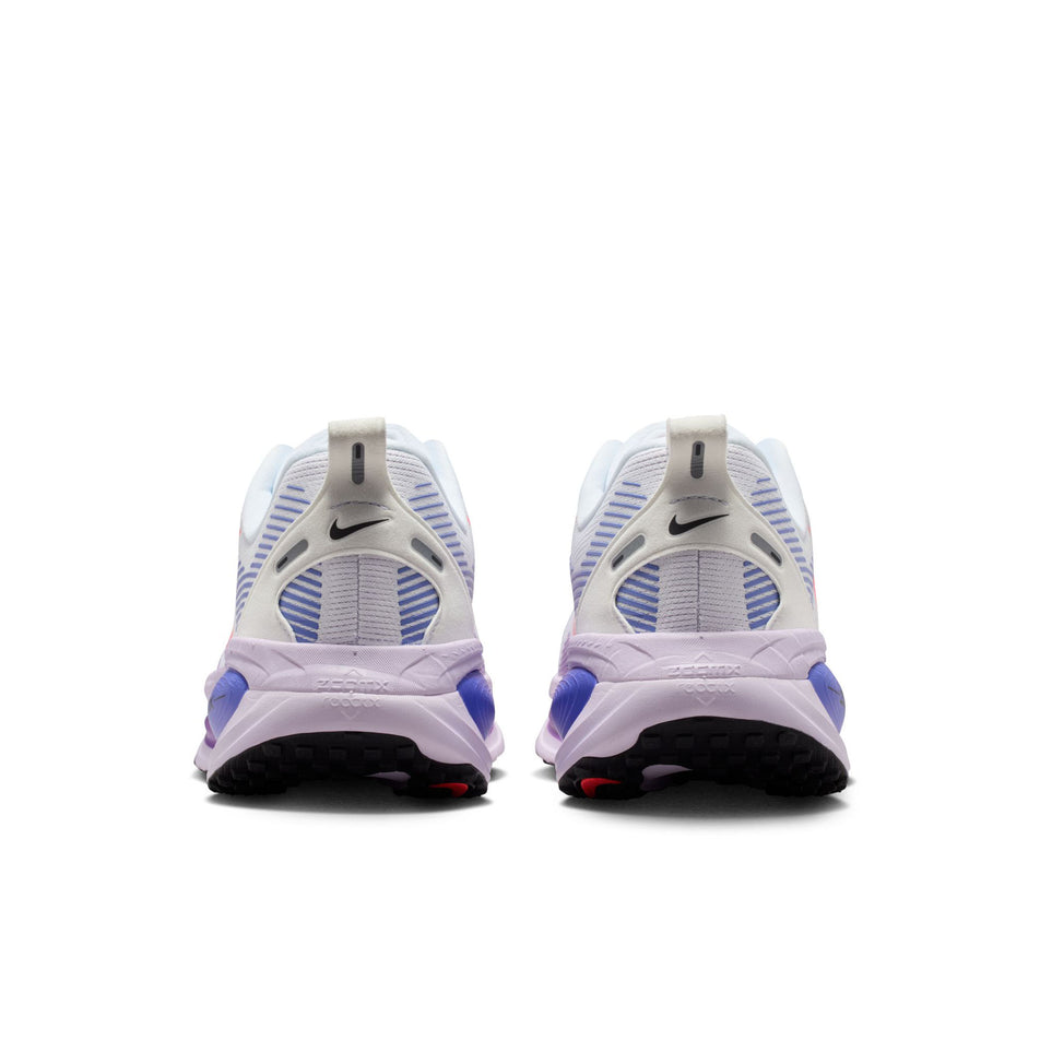 The back of a pair of Nike Women's Vomero 18 Road Running Shoes in the White/Hot Lava-Violet Mist-Sapphire colourway.