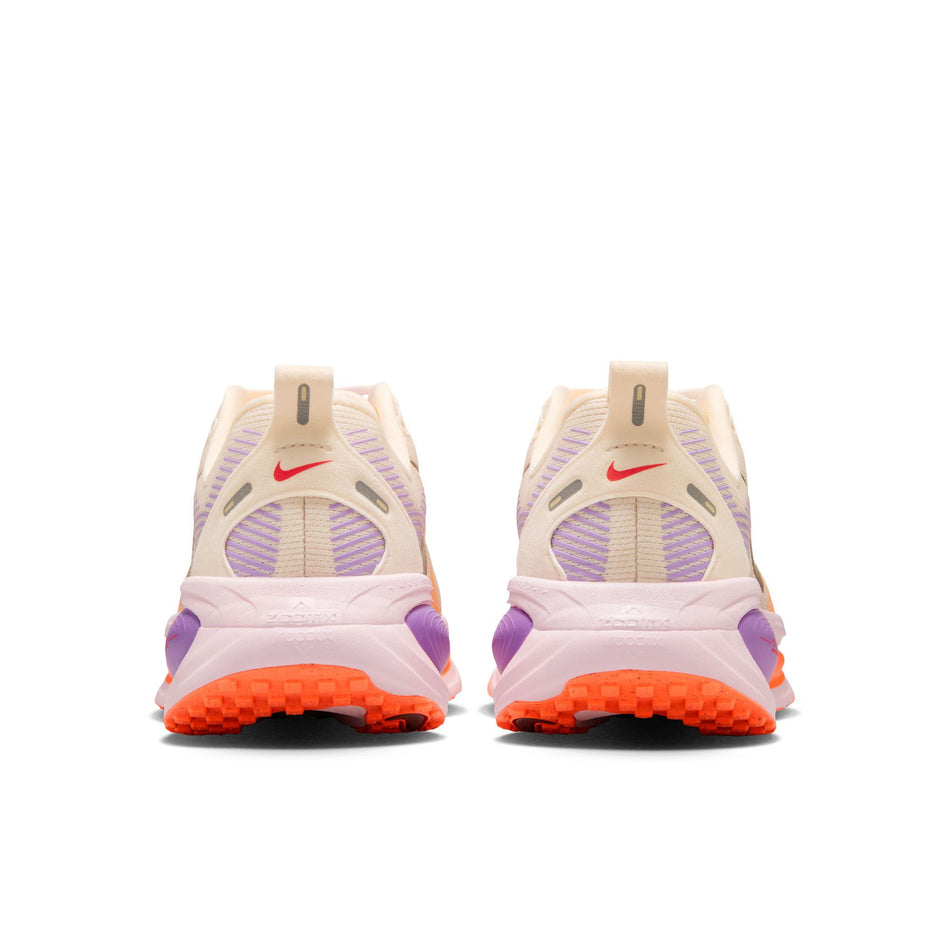 The back of a pair of Nike Women's Vomero 18 Road Running Shoes in the Chalk/Tattoo-Pink Foam-Bright Violet colourway.