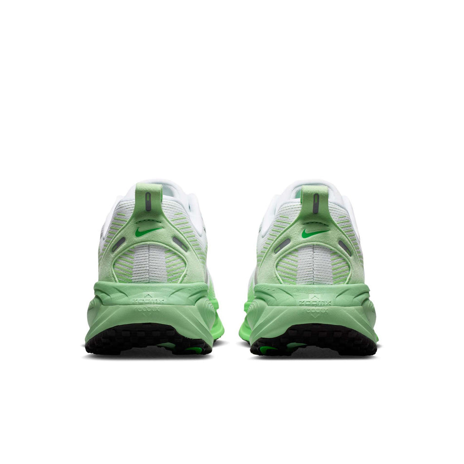 The back of a pair of Nike Women's Vomero 18 Road Running Shoes in the White/Metallic Silver-Illusion Green colourway.