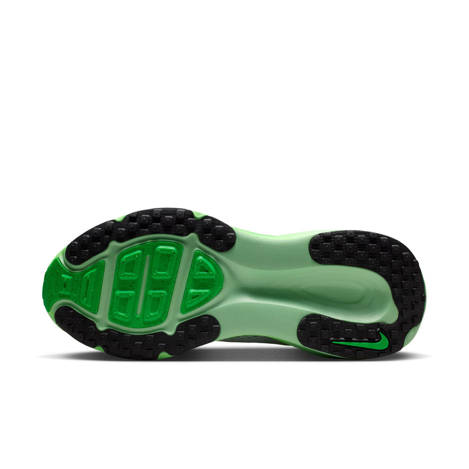 The outsole of the left shoe from a pair of Nike Women's Vomero 18 Road Running Shoes in the White/Metallic Silver-Illusion Green colourway.