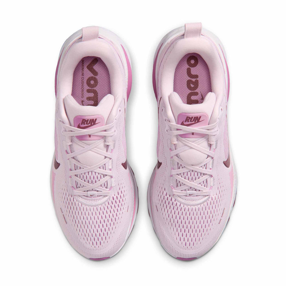 The uppers of a pair of Nike Women's Vomero 18 Road Running Shoes in the Bleached Lilac/Pink Smoke-Light Magenta colourway.