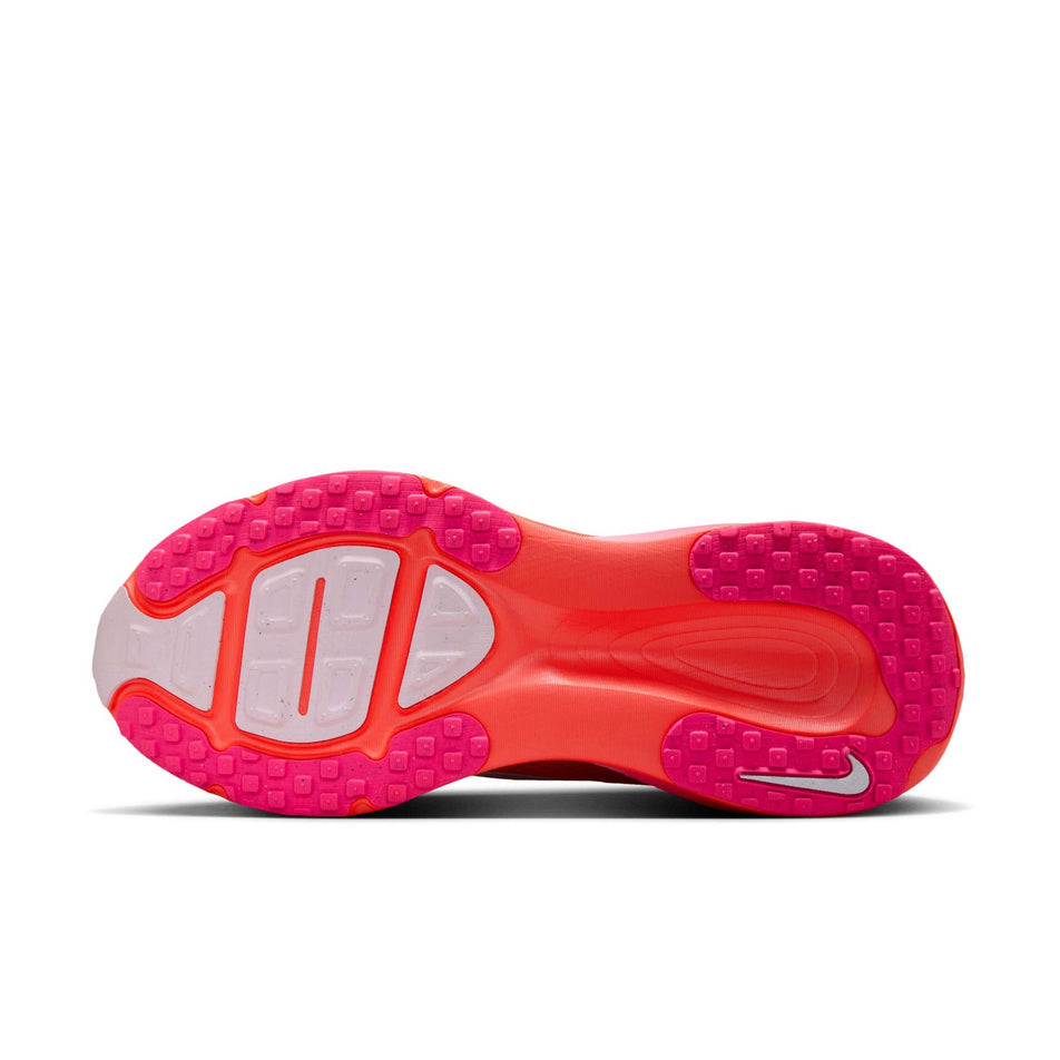 The outsole of the left shoe from a pair of Nike Women's Vomero 18 Road Running Shoes in the Bright Crimson/White-Hyper Pink colourway. (8686791786658)