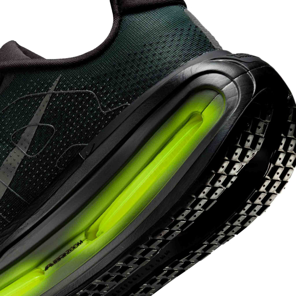 Close-up view of the midsole/outsole of the left shoe from a pair of Nike Men's Vomero Premium Running Shoes in the Black/Iron Grey-Anthracite-Volt colourway.