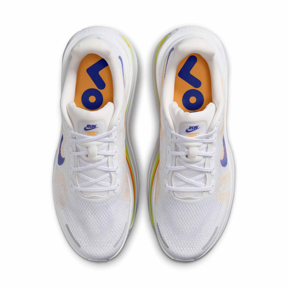 The uppers of a pair of Nike Men's Vomero Premium Road Running Shoes in the White/Lapis-Total Orange-Laser Orange colourway.