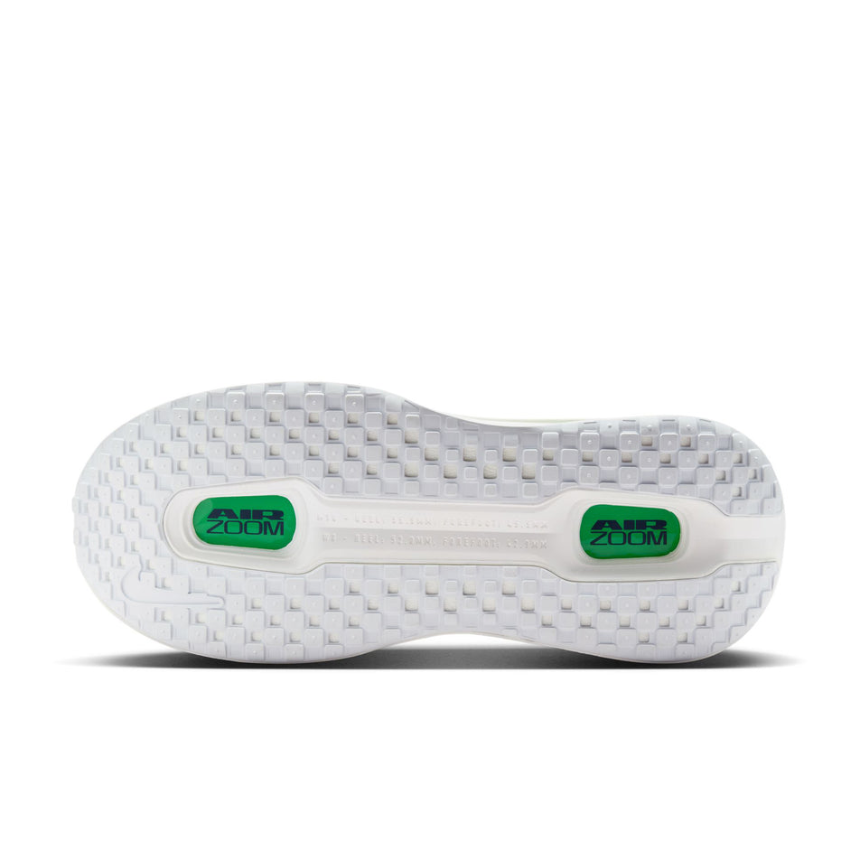 The outsole of the left shoe from a pair of Nike Men's Vomero Premium Road Running Shoes in the White/Midnight Navy-Green Spark colourway.