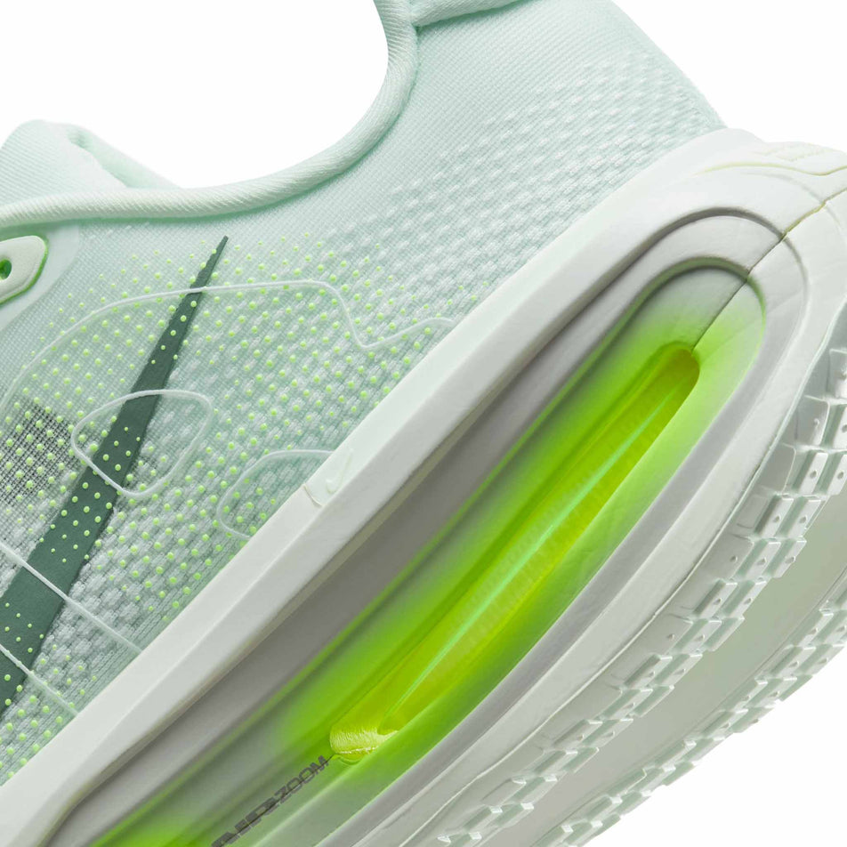 Close-up view of the midsole of the left shoe from a pair of Nike Men's Vomero Premium Running Shoes in the Barely Green/Clay Green-Barely Volt-Volt colourway. (8754887295138)