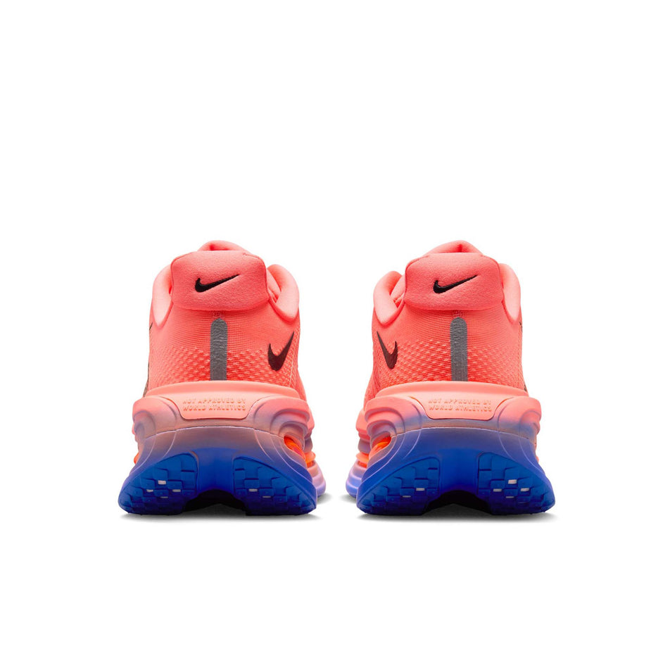 The back of a pair of Nike Men's Vomero Premium Road Running Shoes in the Atomic Pink/Black-Racer Blue colourway.