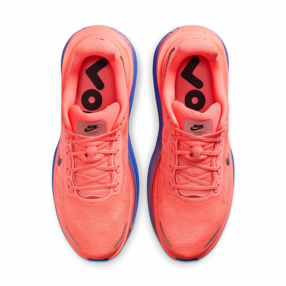 The uppers of a pair of Nike Men's Vomero Premium Road Running Shoes in the Atomic Pink/Black-Racer Blue colourway.