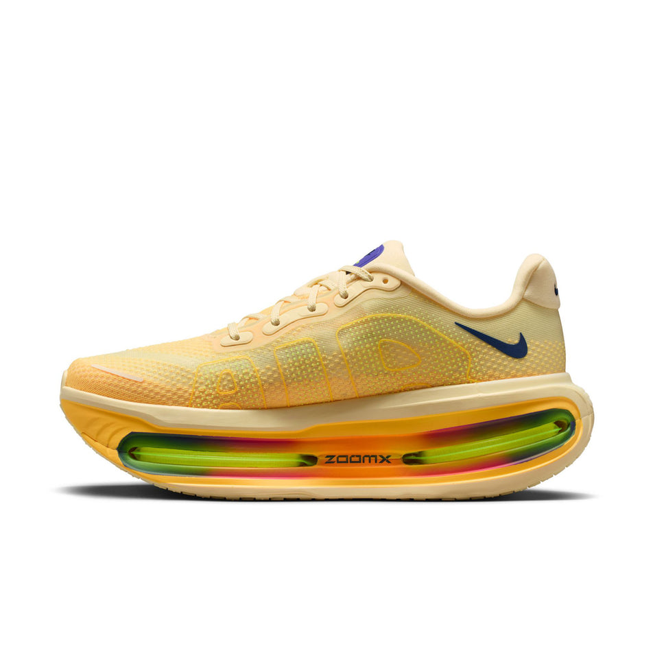 Medial view of the right shoe from a pair of Nike Men's Vomero Premium Road Running Shoes in the Alabaster/Blue Void-Citron Pulse colourway.