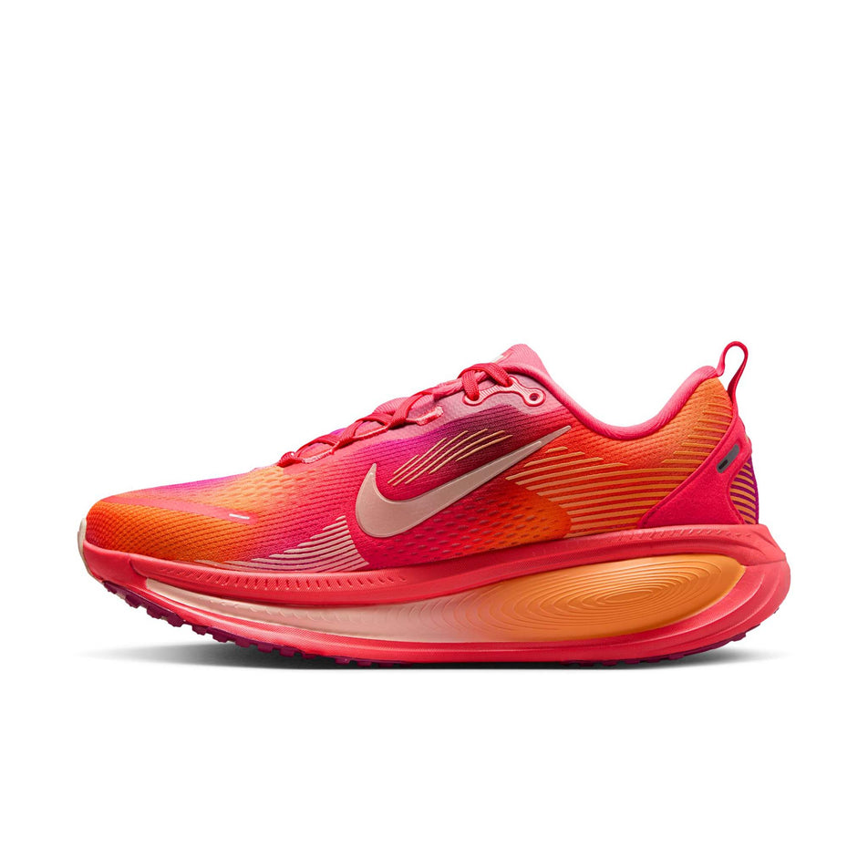 Medial view of the right shoe from a pair of Nike Women's Vomero 18 SE Road Running Shoes in the Ember Glow/Washed Coral-Sweet Beet colourway. (8725394751650)