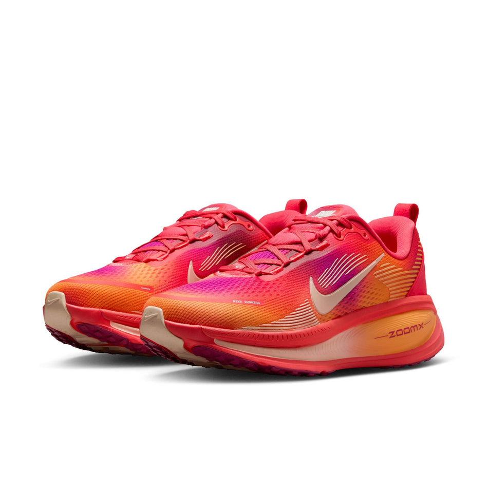 A pair of Nike Women's Vomero 18 SE Road Running Shoes in the Ember Glow/Washed Coral-Sweet Beet colourway. (8725394751650)