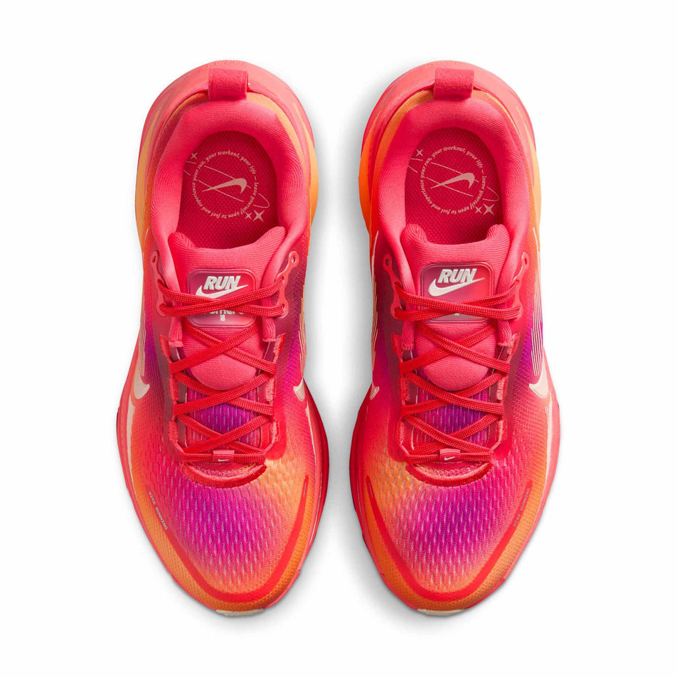 The uppers of a pair of Nike Women's Vomero 18 SE Road Running Shoes in the Ember Glow/Washed Coral-Sweet Beet colourway. (8725394751650)
