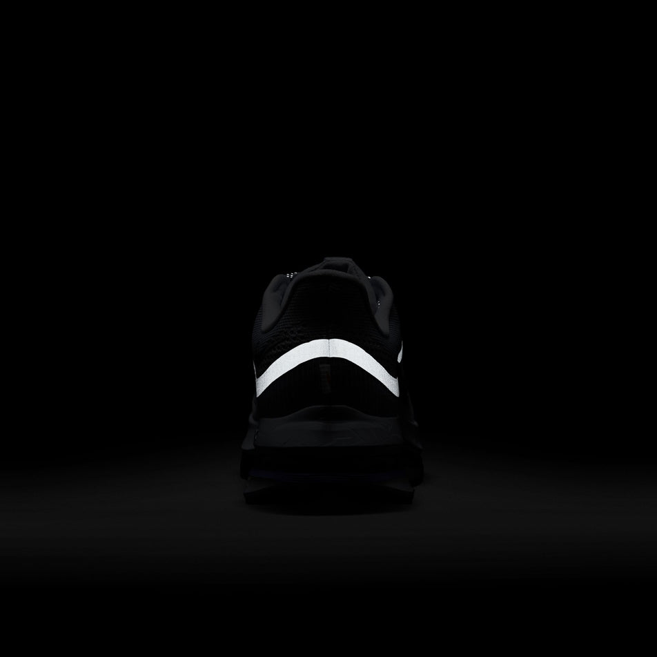 The reflective graphic on the back of the left shoe from a pair of Nike Men's Pegasus Premium Road Running Shoes in the Ghost/Black-Persian Violet colourway. (8614448922786)