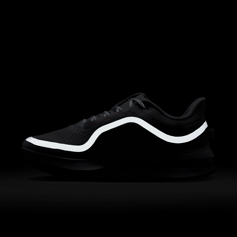 The reflective graphic on the medial side of the left shoe from a pair of Nike Men's Pegasus Premium Road Running Shoes in the Ghost/Black-Persian Violet colourway.  (8614448922786)