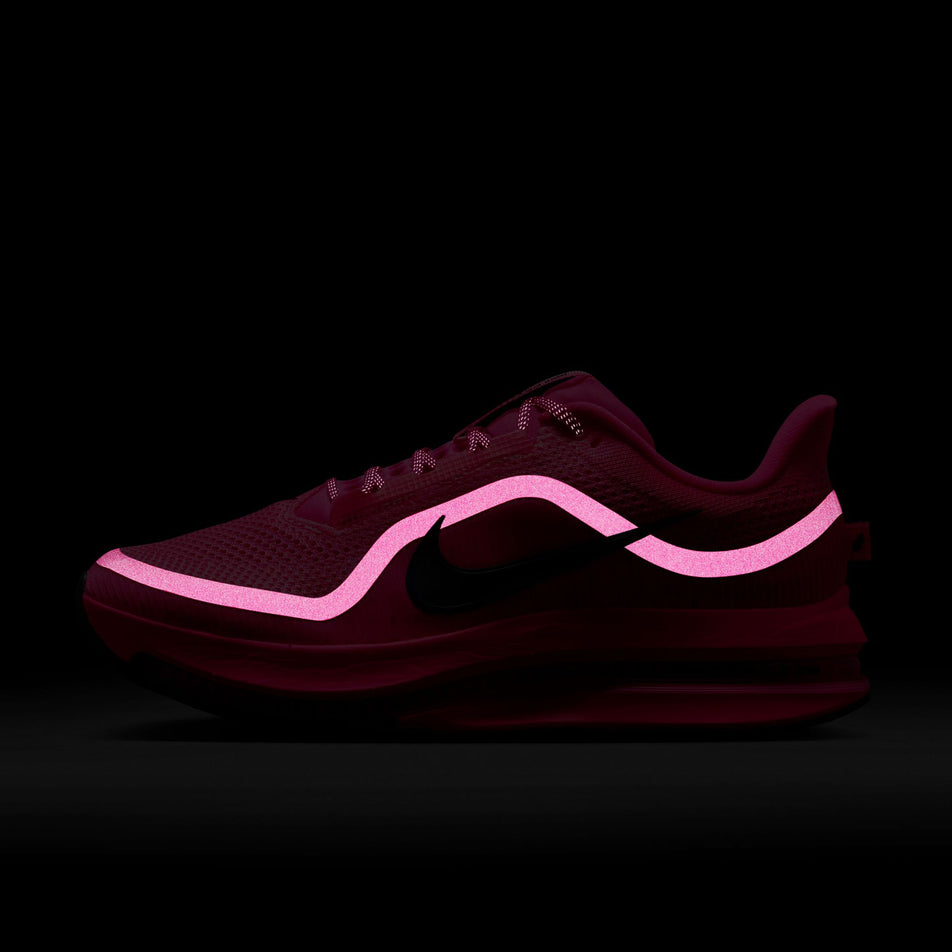 The reflective graphic on the lateral side of the left shoe from a pair of Nike Men's Pegasus Premium Road Running Shoes in the Hyper Pink/Sequoia-Bright Crimson colourway. (8636656582818)