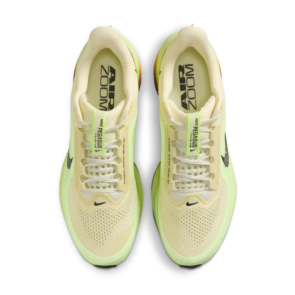 The uppers of a pair of Nike Men's Pegasus Premium Road Running Shoes in the Alabaster/Black-Barely Volt-Volt Ice colourway.