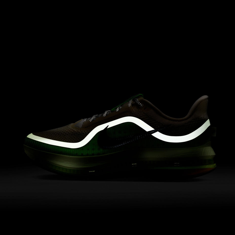 The reflective graphic on the lateral side of the left shoe from a pair of Nike Men's Pegasus Premium Road Running Shoes in the Alabaster/Black-Barely Volt-Volt Ice colourway.