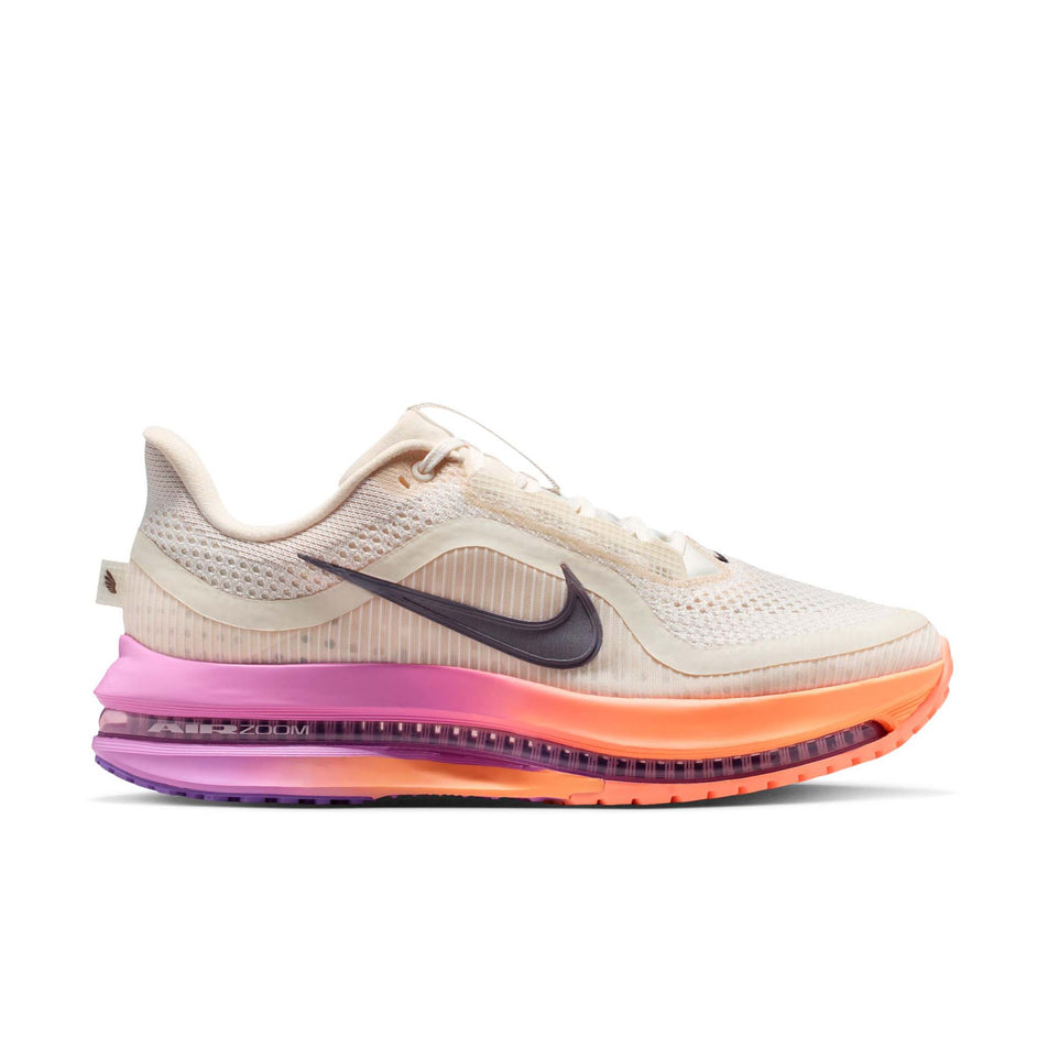 Lateral view of the right shoe from a pair of Nike Women's Pegasus Premium Road Running Shoes in the Chalk/Tattoo-Orange Pulse-Light Magenta colourway.