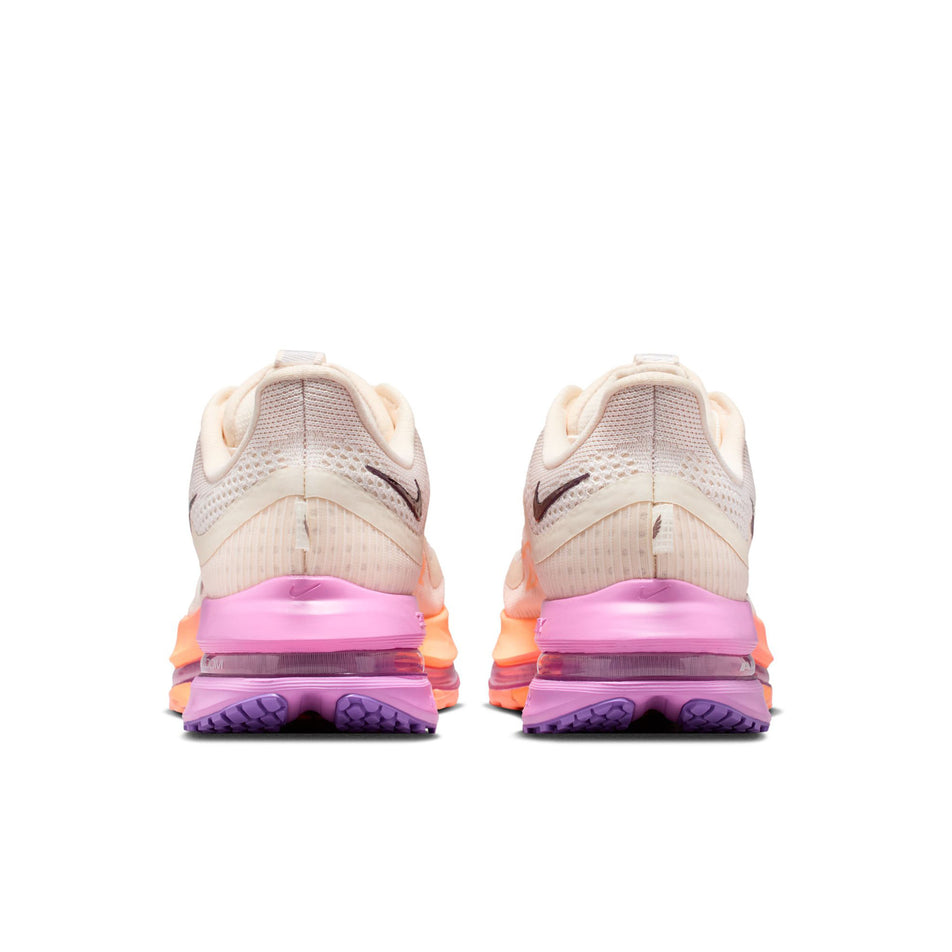 The back of a pair of Nike Women's Pegasus Premium Road Running Shoes in the Chalk/Tattoo-Orange Pulse-Light Magenta colourway.
