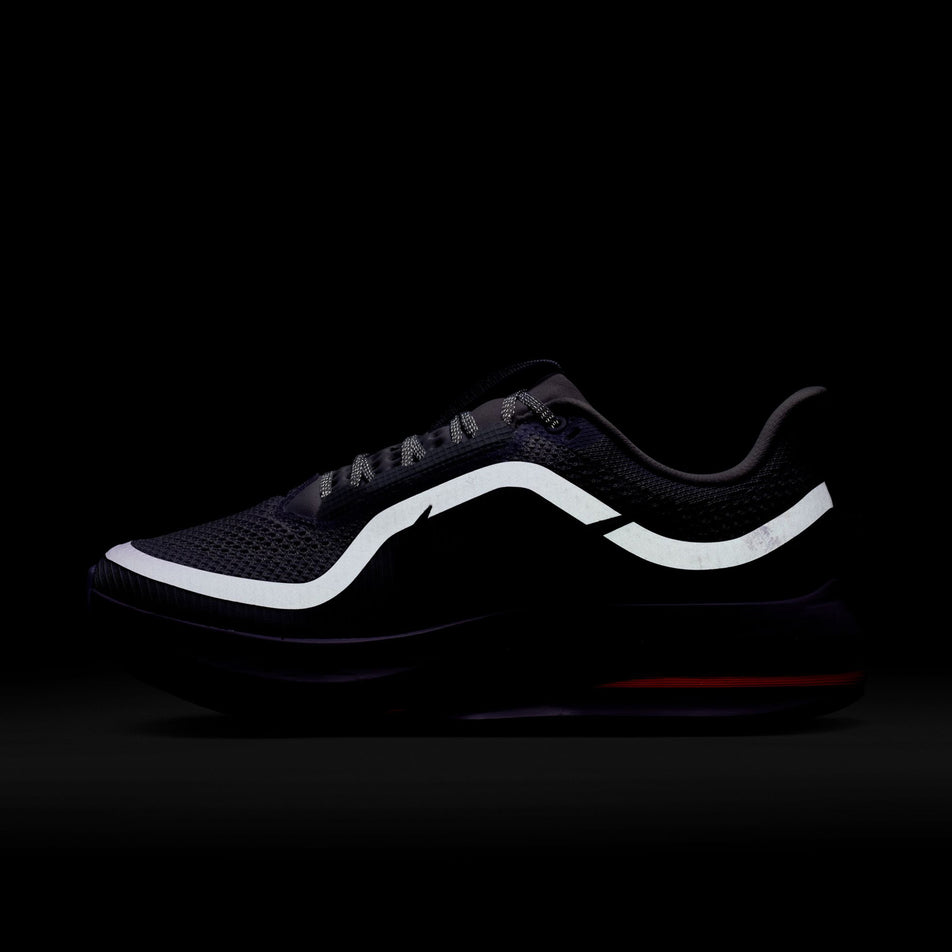 The reflective graphic on the lateral side of the left shoe from a pair of Nike Women's Pegasus Premium Road Running Shoes in the Barely Grape/Purple Dynasty-Violet Mist colourway.