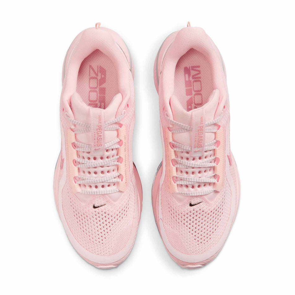 The uppers on a pair of Nike Women's Pegasus Premium Road Running Shoes in the Atmosphere/Red Stardust-Metallic Silver. (8615426523298)
