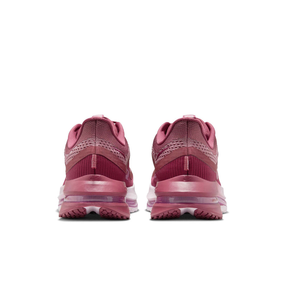 The back of a pair of Nike Women's Pegasus Premium Road Running Shoes in the Pink Smoke/Pink Smoke-Light Magenta colourway.