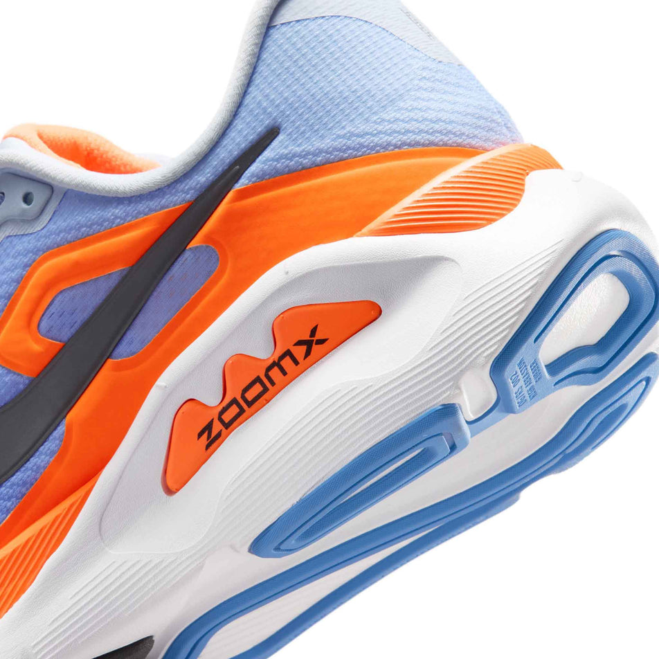 Close-up view of the rearfoot section of the left shoe from a pair of the Nike Men's Structure Plus Road Running Shoes in the Hydrogen Blue/Off Noir-Blue Crystal colourway.
