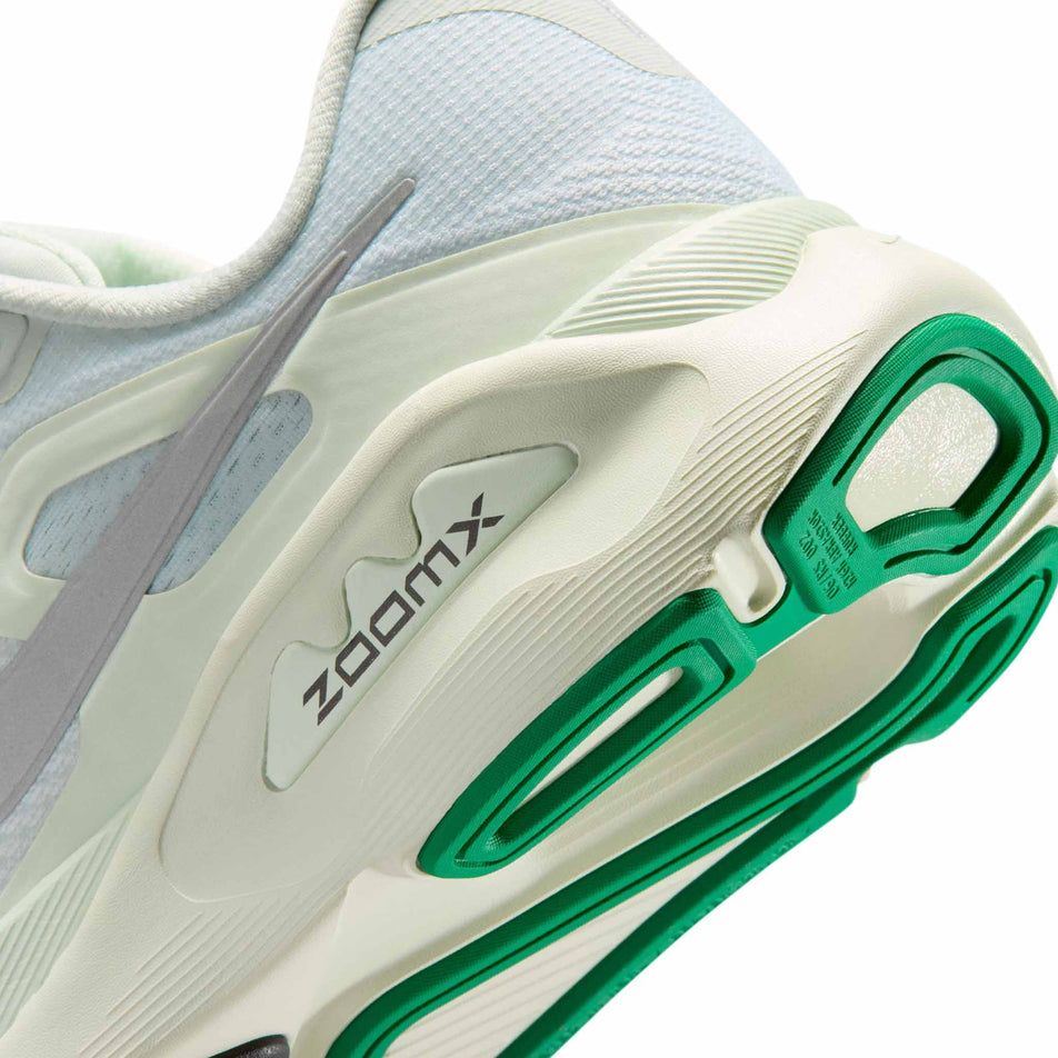 Close-up view of the rearfoot section shoe from a pair of Nike Women's Structure Plus Road Running Shoes in the Light Silver/Metallic Silver colourway.