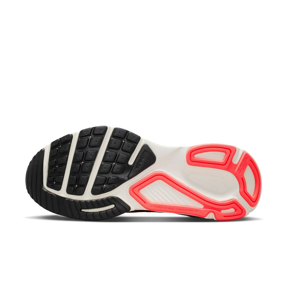 The outsole of the left shoe from a pair of Nike Women's Structure Plus Road Running Shoes in the Tattoo/Silver-Hot Lava-Black colourway.