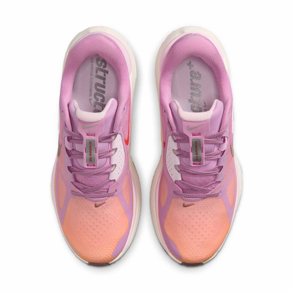 The uppers of a pair of Nike Women's Structure Plus Road Running Shoes in the Light Magenta/Tattoo-Orange Pulse-Pink Foam colourway.