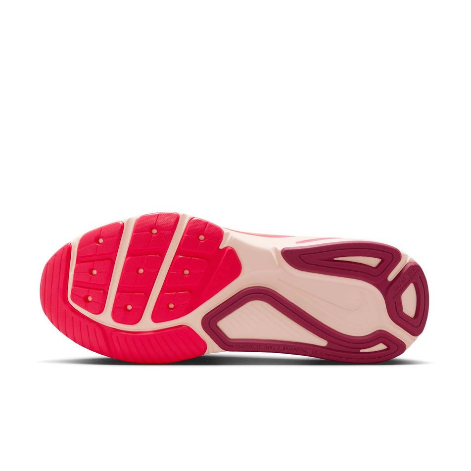 The outsole of the left shoe from a pair of Nike Women's Structure 26 SE Road Running Shoes in the Ember Glow/Washed Coral-Sweet Beet colourway. (8725403566242)