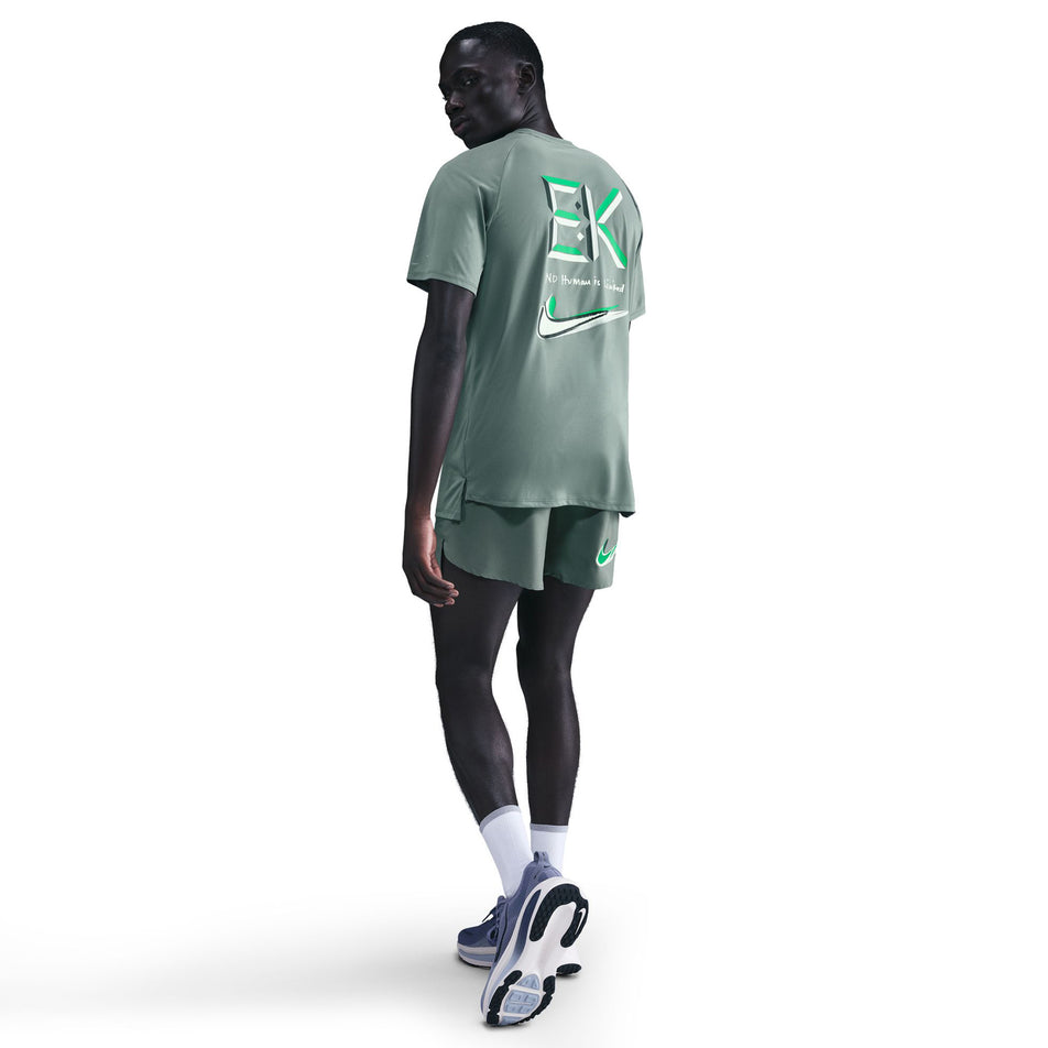 Back view of a model wearing the Nike Men's Stride 