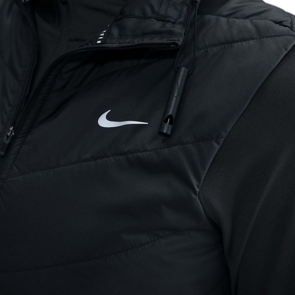 The whistle on the Nike Women's Swift Therma-FIT Running Vest in the Black/Reflective Silver colourway.