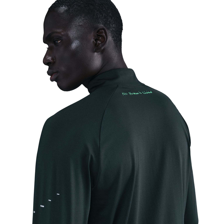 Back view of a model wearing the Nike Men's Stride 