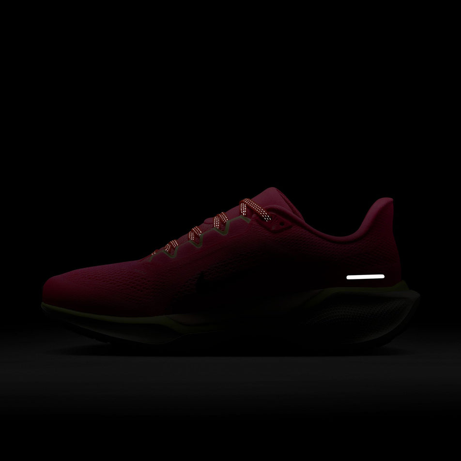 The reflective details on the medial side of the left shoe from a pair of Nike Women's Pegasus 41 Road Running Shoes in the Hyper Pink/Sequoia-Guava Ice colourway.(8620734120098)