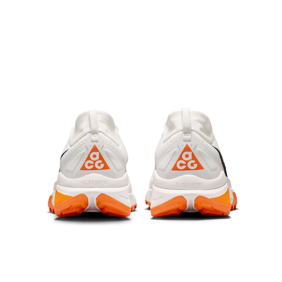 The back of a pair of Nike Women's ACG Zegama Trail Running Shoes -in the Summit White/Black-Phantom-Safety Orange colourway.