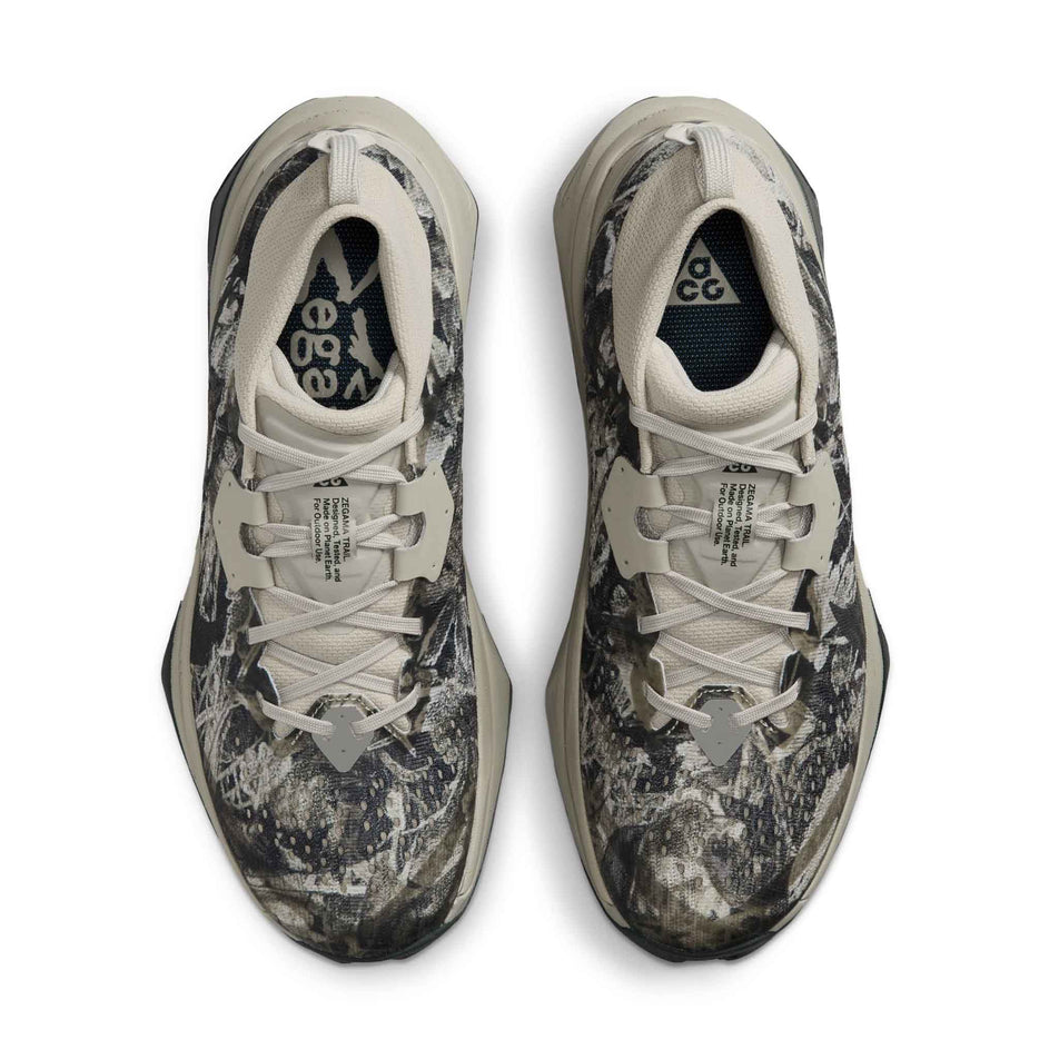 The uppers of a pair of Nike Women's ACG Zegama Trail Running Shoes in the Spruce Fog/Black Spruce-Sea Glass-Black colourway.