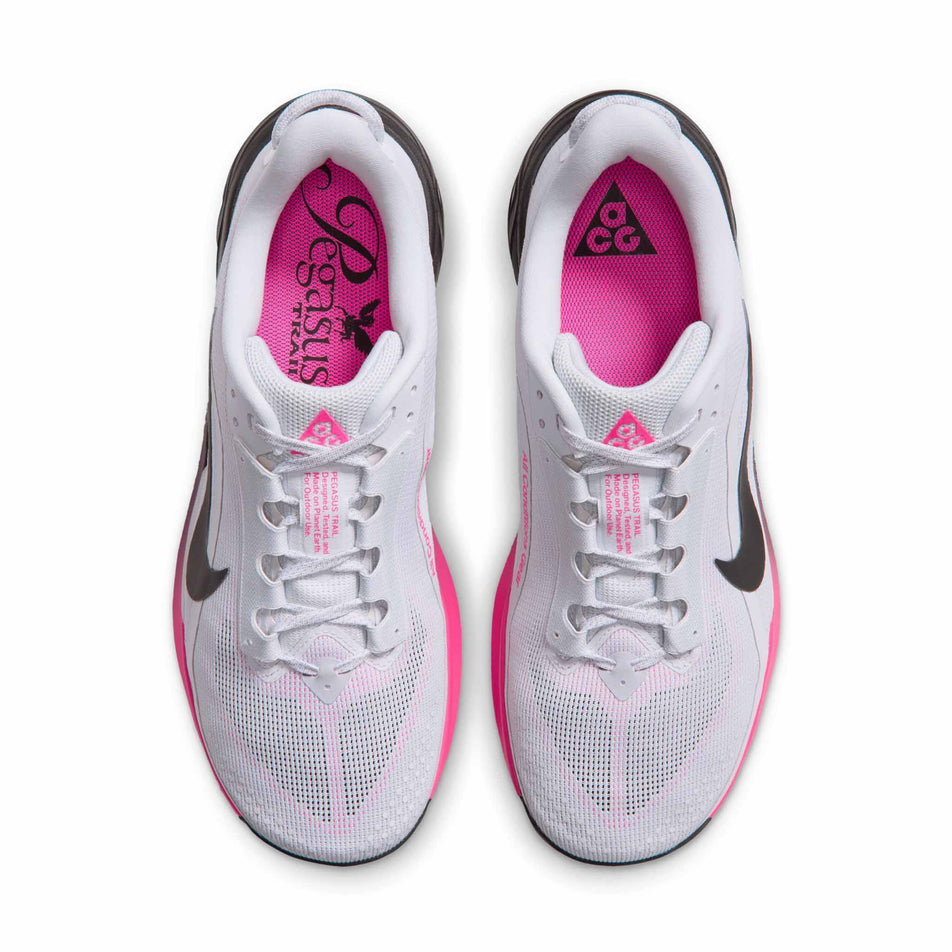 The uppers of a pair of Nike Men's ACG Pegasus Trail Running Shoes in the Pure Platinum/Black-Hyper Pink colourway.