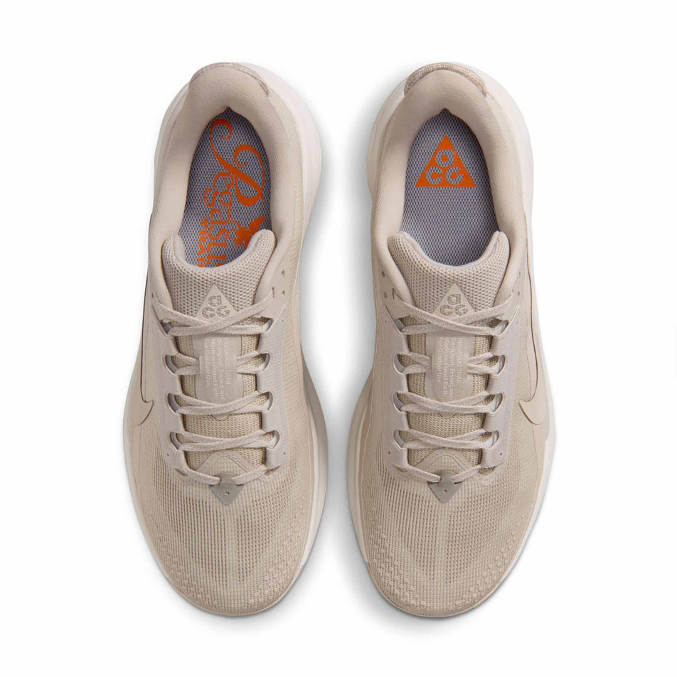 The uppers of a pair of Nike Men's ACG Pegasus Trail Running Shoes in the Cream II/Cream II-Light Orewood Brown colourway.