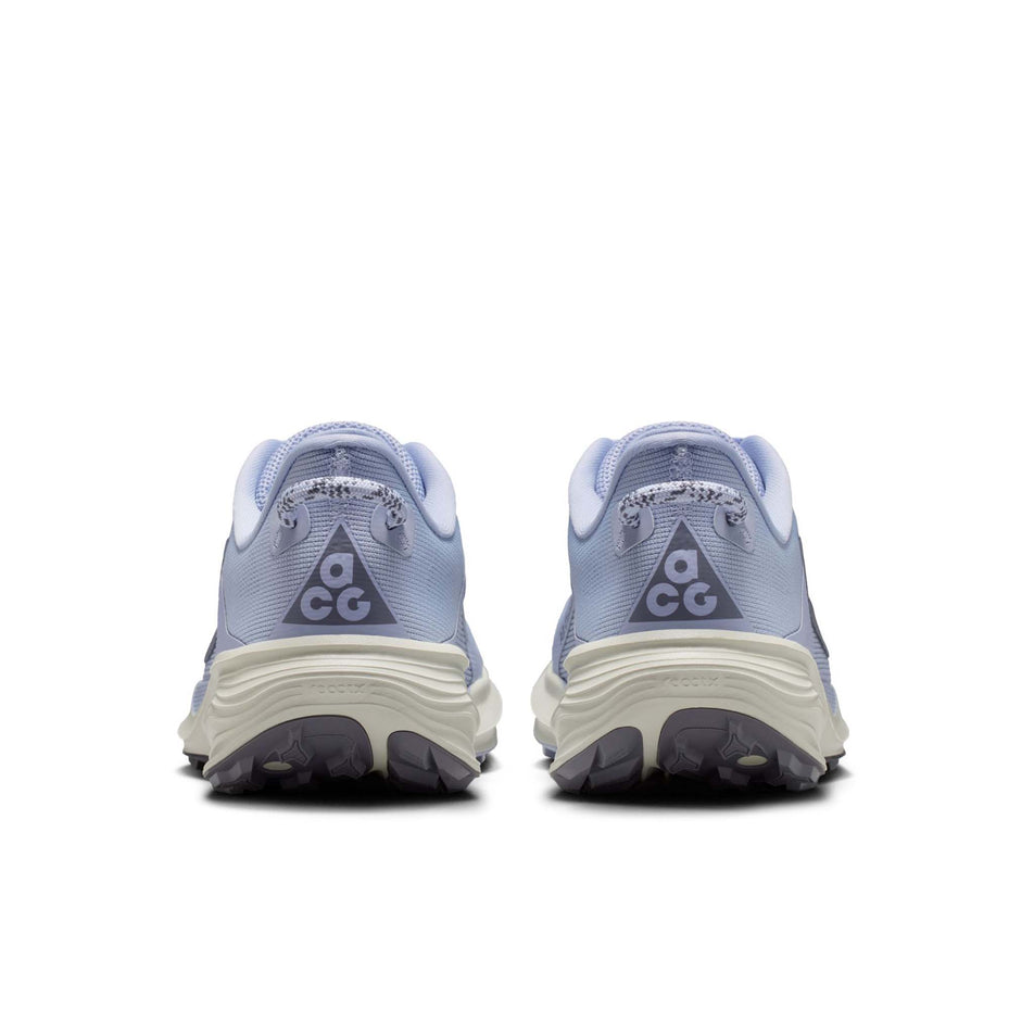 The back of a pair of Nike Women's ACG Pegasus Trail Running Shoes in the Ghost/Cement Grey-Mineral Slate colourway.