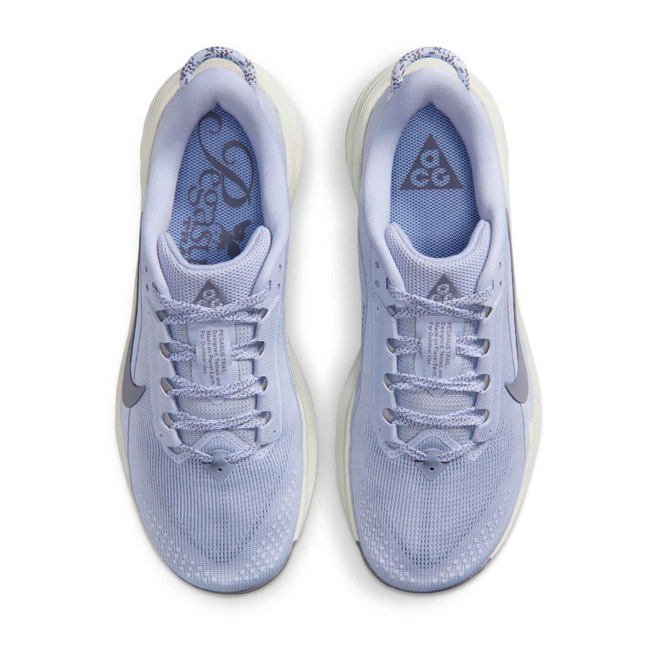 The uppers of a pair of Nike Women's ACG Pegasus Trail Running Shoes in the Ghost/Cement Grey-Mineral Slate colourway.