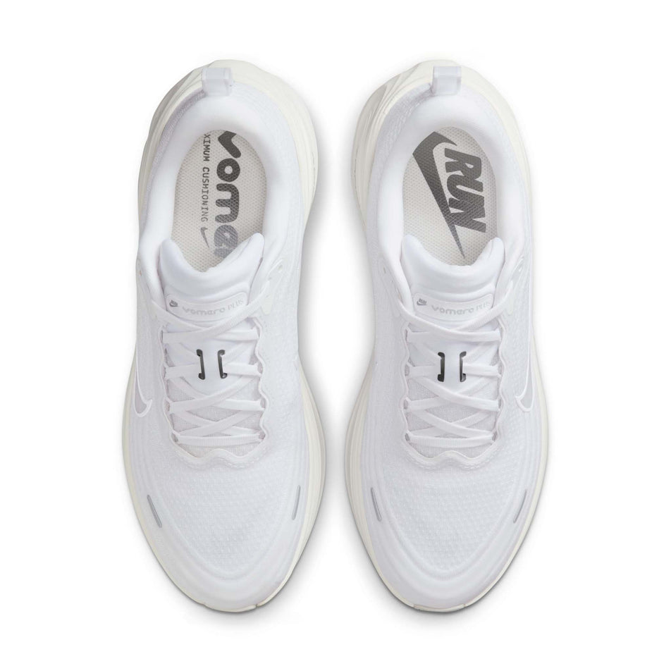 The uppers of a pair of Nike Men's Vomero Plus Road Running Shoes in the White/Summit White-Photon Dust colourway. (8723689111714)
