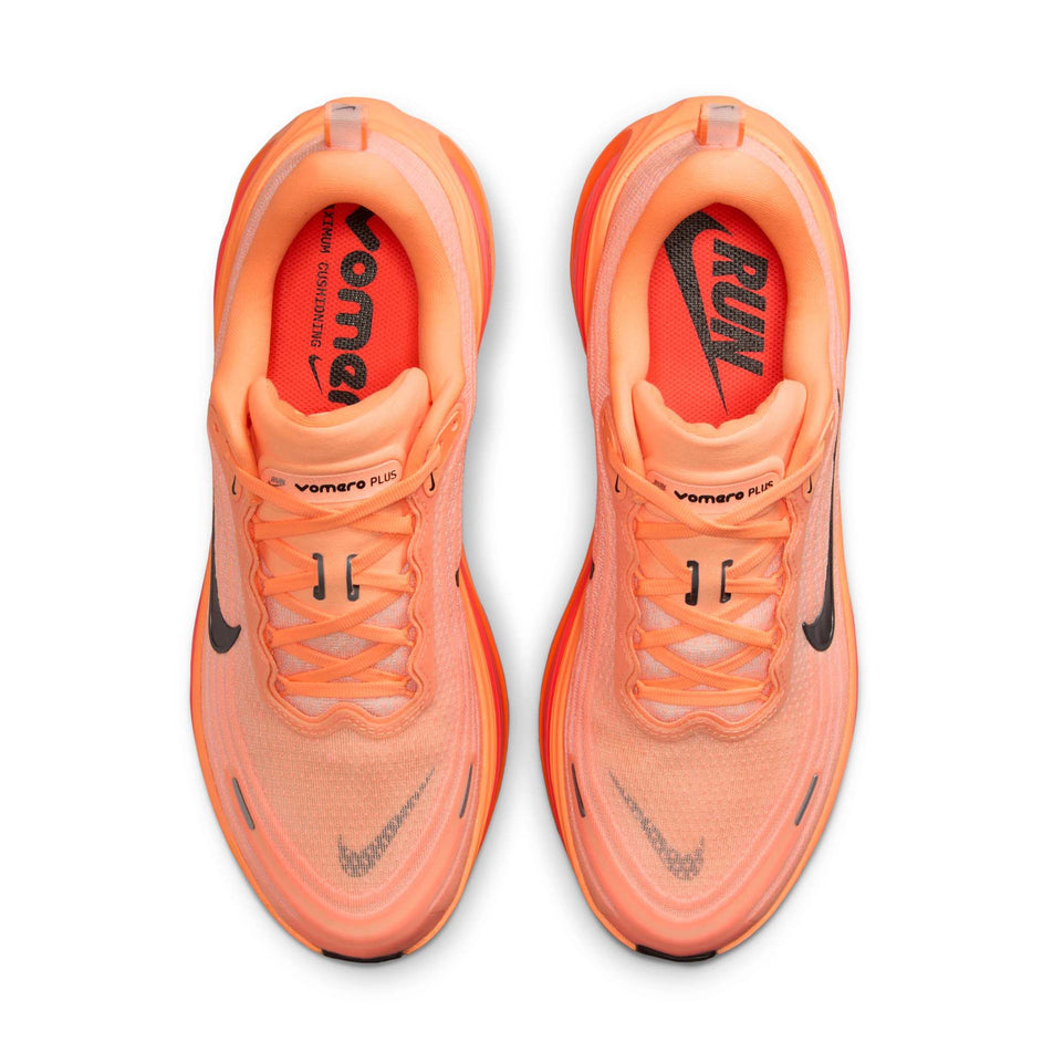 The uppers of a pair of Nike Men's Vomero Plus Road Running Shoes in the Orange Pulse/Black-Hot Lava-Total Orange-Orange Chalk-Metallic Dark Grey colourway. (8725442330786)