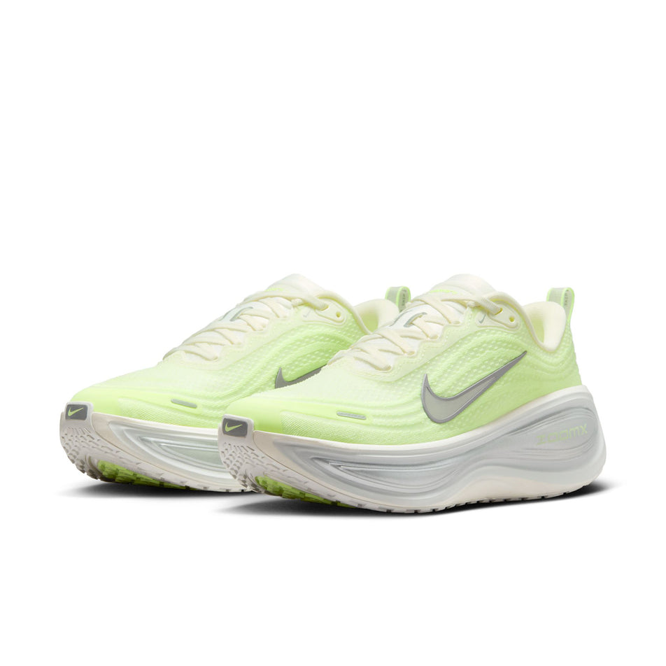 A pair of Nike Women's Vomero Plus Road Running Shoes in the Sail/Metallic Silver-Barely Volt colourway. (8725325480098)